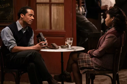 HD wallpaper featuring two characters from Interview with the Vampire TV show, engaged in an intense conversation at a café table.