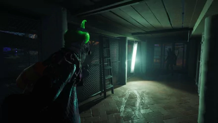 HD wallpaper of the video game Killer Klowns from Outer Space: The Game, featuring a dark, eerie hallway with a clown character approaching a shadowy figure.