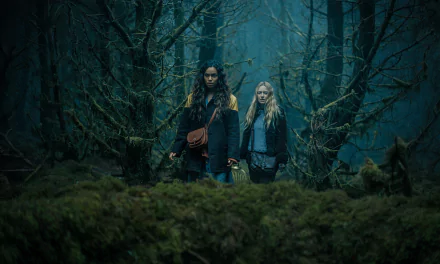 HD desktop wallpaper featuring Dakota Fanning and Georgina Campbell in a forest scene from the 2024 movie The Watchers.
