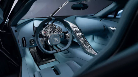 HD desktop wallpaper featuring the luxurious interior of a Bugatti vehicle, tagged as Bugatti Tourbillon, showcasing a sleek dashboard and sophisticated design elements.
