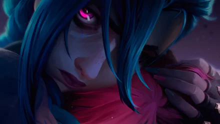 HD desktop wallpaper of Jinx from the TV show Arcane Season 2, showcasing her intense gaze and vibrant blue hair.