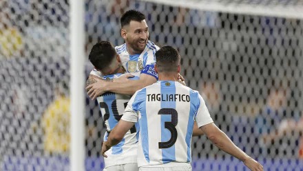 Argentina National Football Team players, including Lionel Messi, celebrate during a Copa América soccer match. (HD desktop wallpaper and background)