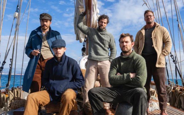 HD desktop wallpaper featuring five male characters from the TV show The Ministry of Ungentlemanly Warfare standing on a sailing ship.