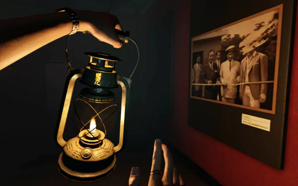 A screenshot from The Bridge Curse 2: The Extrication video game, featuring a hand holding a lit lantern next to a historical photo in a dimly-lit room. High-definition desktop wallpaper and background.