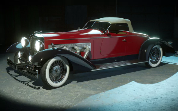 HD desktop wallpaper featuring a detailed vintage car from the video game Mafia: Definitive Edition, illuminated under a spotlight in a dim setting.