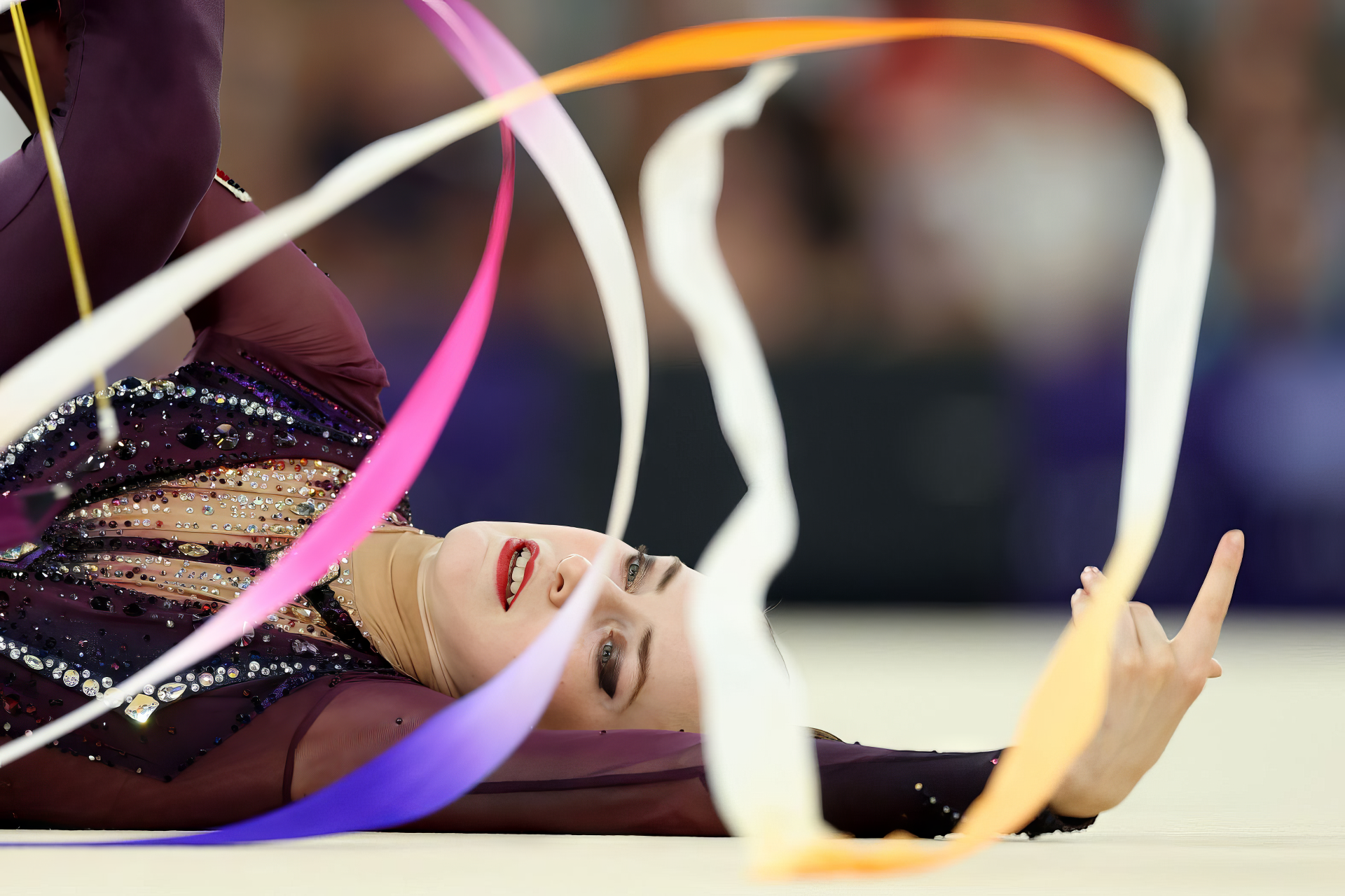 HD desktop wallpaper featuring rhythmic gymnastics at the Olympic Games Paris 2024, showcasing Germany's participation in this dynamic sport.