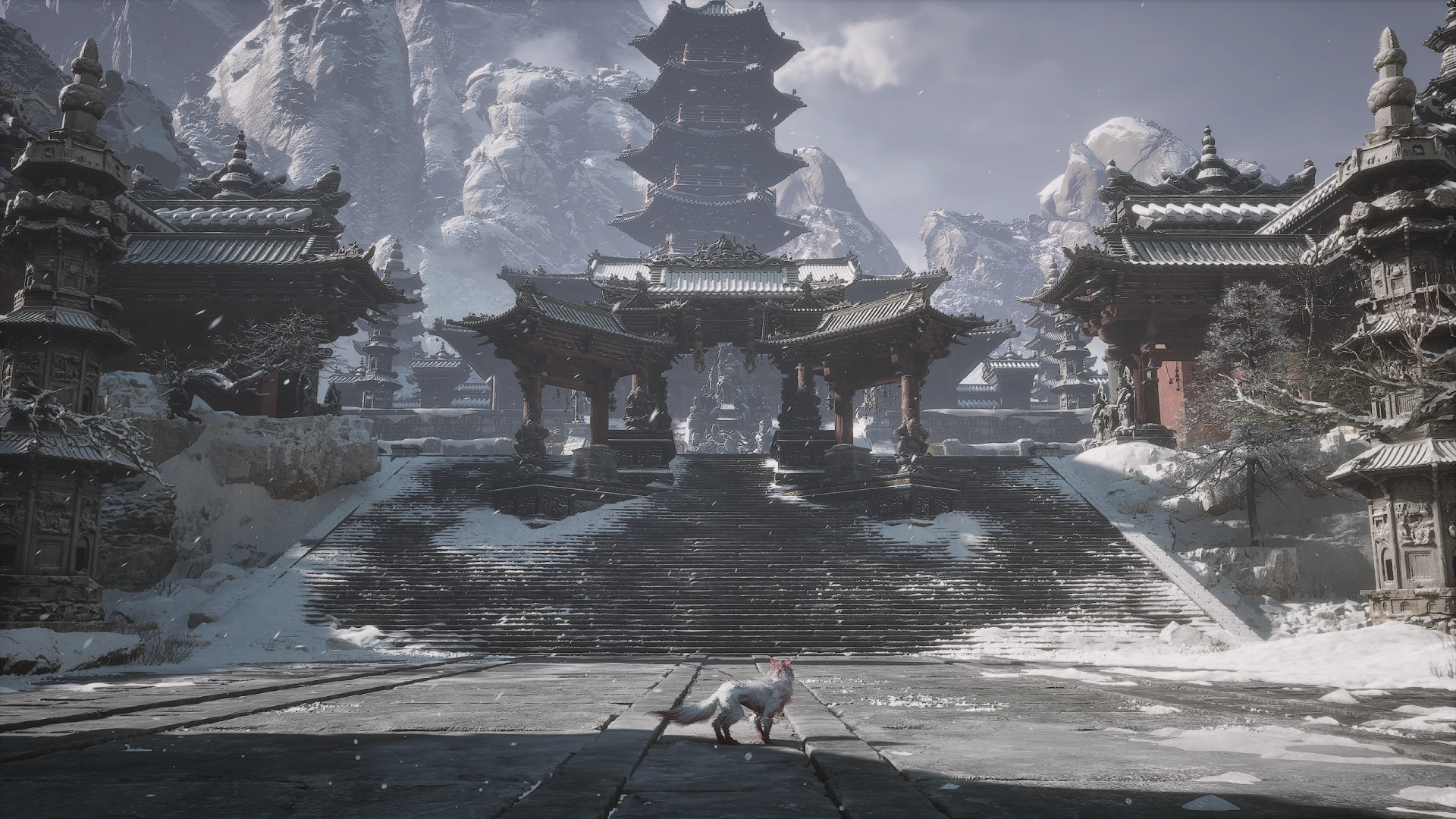 HD PC desktop wallpaper from Black Myth: Wukong, featuring a detailed snowy temple courtyard with traditional architecture and a lone figure in the foreground.