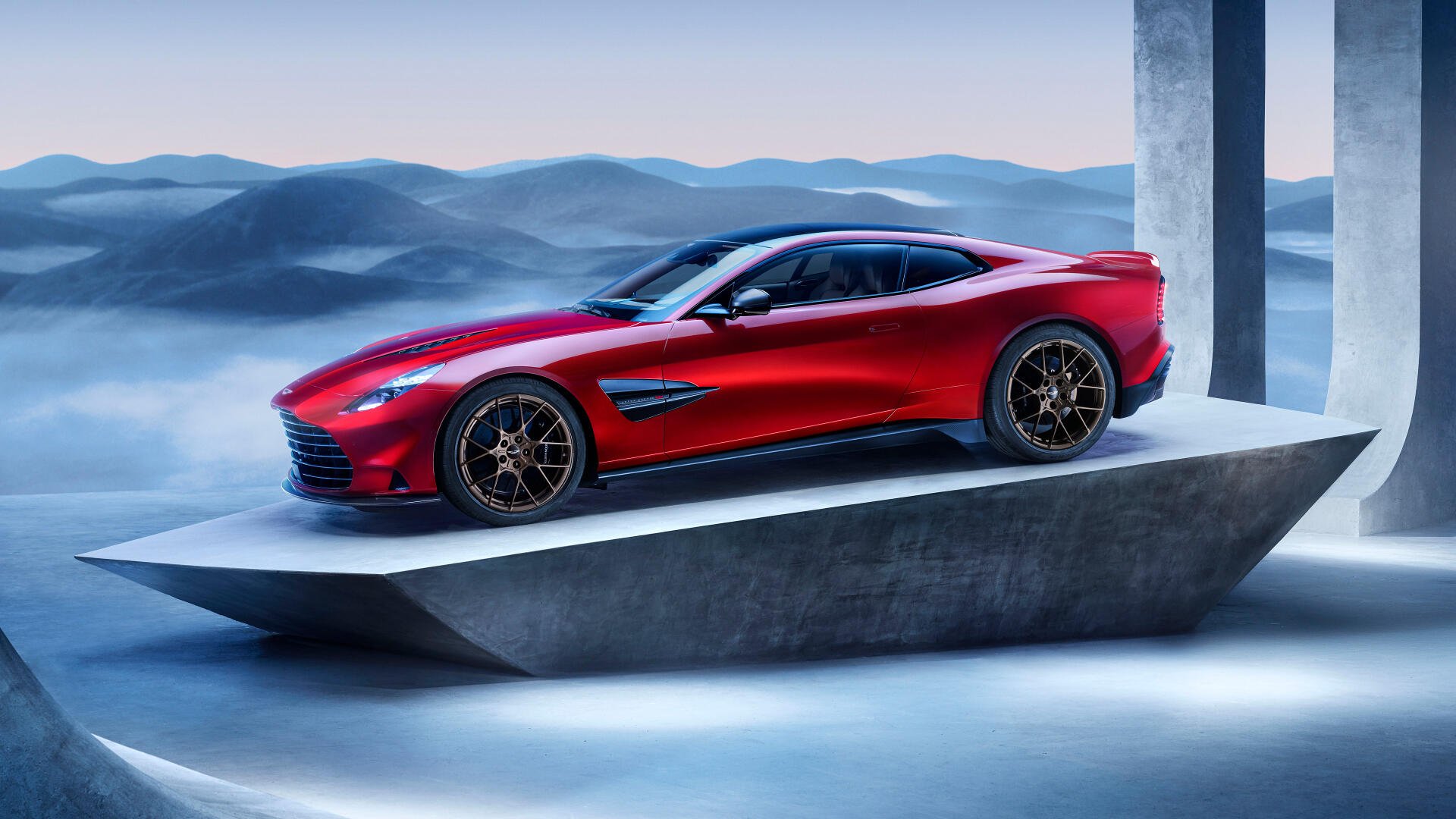 A stunning 4K Ultra HD wallpaper featuring an Aston Martin Vanquish, showcasing its sleek design and luxurious appeal against a dramatic backdrop.