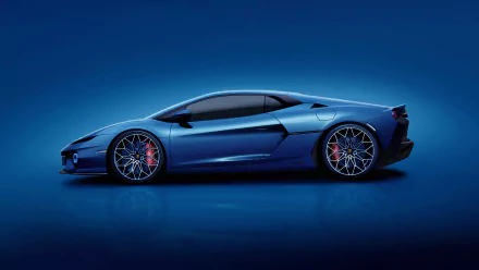 A striking HD wallpaper featuring a blue Lamborghini Temerario, showcasing its sleek design and bold aesthetics against a deep blue background.