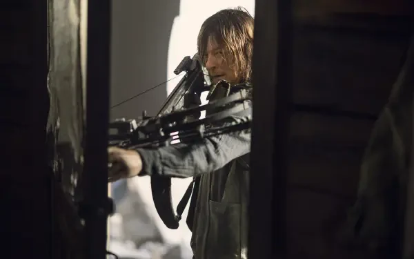 HD desktop wallpaper featuring Norman Reedus from the TV show The Walking Dead, showcasing the intense atmosphere of the series.