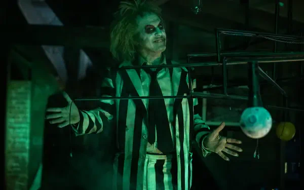 An 8K Ultra HD wallpaper featuring Michael Keaton from the classic movie Beetlejuice, capturing the film's iconic style and character.