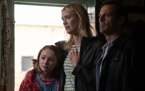 A dramatic moment from the movie Speak No Evil, featuring a woman and two others standing together, conveying emotions of concern and tension. This image serves as a striking 4K Ultra HD desktop wallpaper.