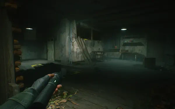 A dark, atmospheric scene from the video game A Quiet Place: The Road Ahead, featuring a character holding a flashlight in a cluttered, eerie environment. HD PC desktop wallpaper.