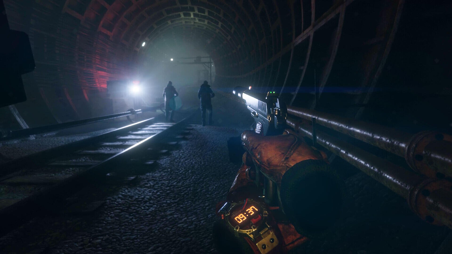 A moody HD wallpaper from the video game Metro Awakening, featuring a dimly lit subway tunnel with a character holding a weapon and two shadowy figures in the background.