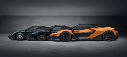 Three stunning McLaren vehicles, including the McLaren W1, are showcased in a sleek, modern setting. The image highlights their dynamic designs and performance-driven aesthetics in 8K Ultra HD.