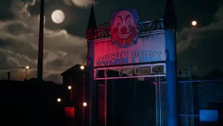 A dimly lit entrance of Ocean Park features a clown face under a full moon, embodying the eerie atmosphere of Dead Island 2 in this captivating 4K Ultra HD wallpaper.