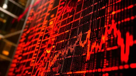 A vibrant stock market chart in red tones displays fluctuating data, capturing the dynamic essence of trading. This 4K Ultra HD image serves as an engaging desktop wallpaper and background.