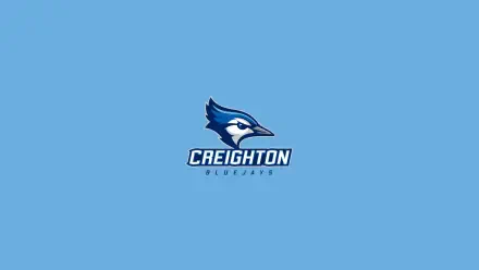 Creighton Bluejays logo on a blue background, designed as a high-definition PC desktop wallpaper, showcasing the team's identity and spirit.