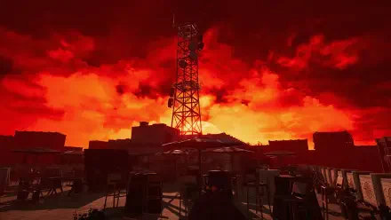 A dramatic HD wallpaper for the game The Inn-Sanity, featuring a silhouetted tower against a fiery red sky, creating an intense and captivating atmosphere.