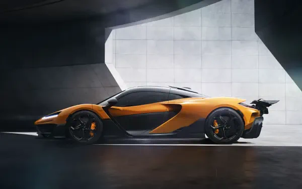 A sleek McLaren W1 sports car in vibrant orange showcased in a modern, minimalist setting. 8K Ultra HD PC desktop wallpaper highlighting the vehicle's aerodynamic design.