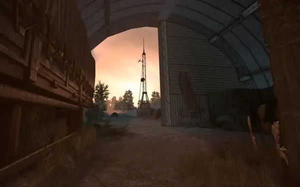 A captivating HD PC desktop wallpaper from STALCRAFT: X, showcasing an industrial landscape at dusk with a silhouette of a radio tower and abandoned structures.