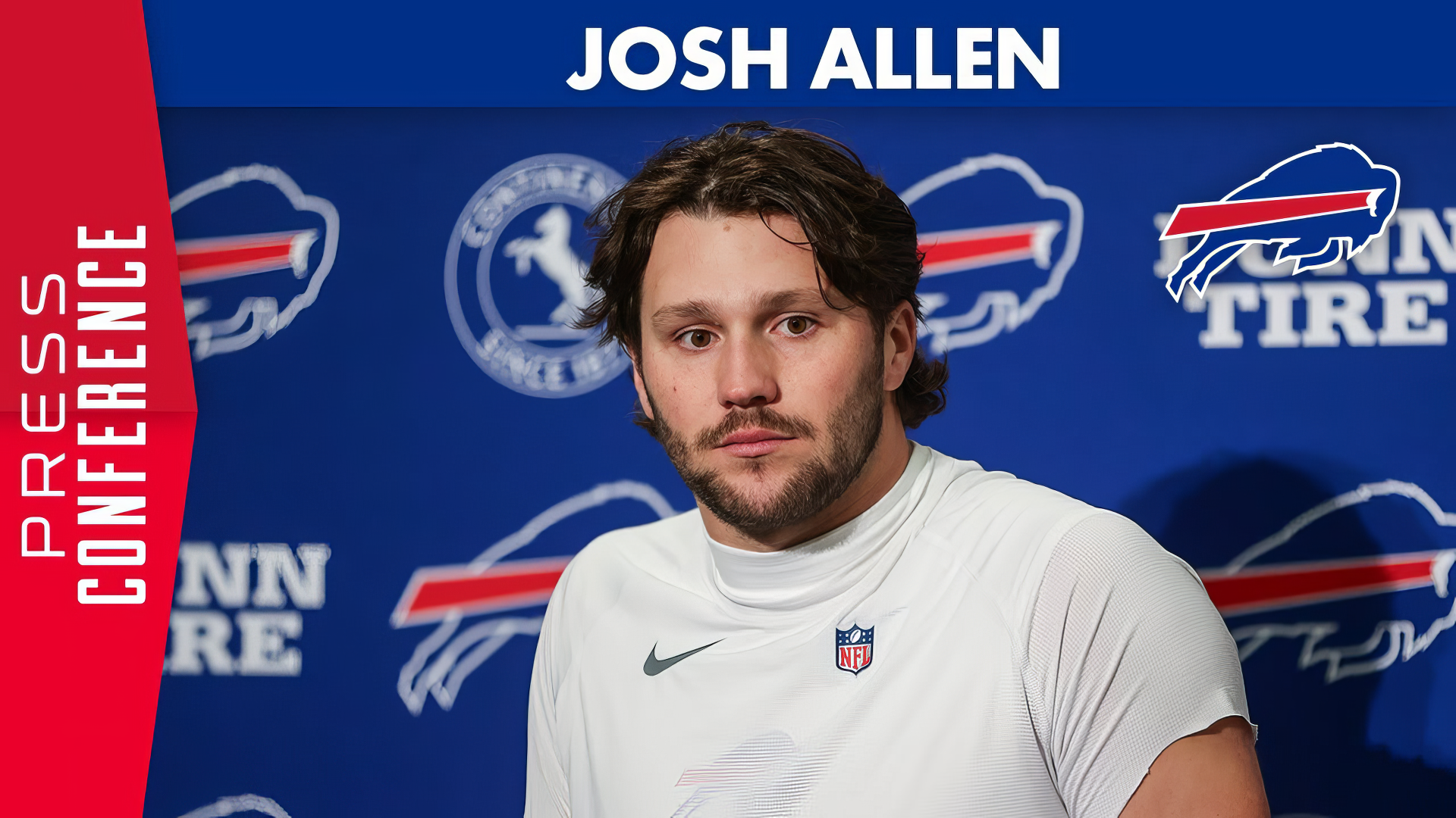 Josh Allen, quarterback for the Buffalo Bills, poses during a press conference, set against a bold background featuring the team’s colors and logos. HD desktop wallpaper.