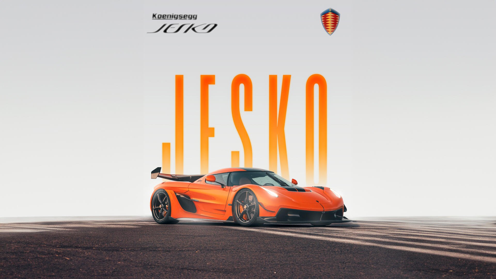 Orange Koenigsegg Jesko supercar parked on asphalt with bold JESKO text, featuring 4K Ultra HD clarity for PC desktop wallpaper and background.