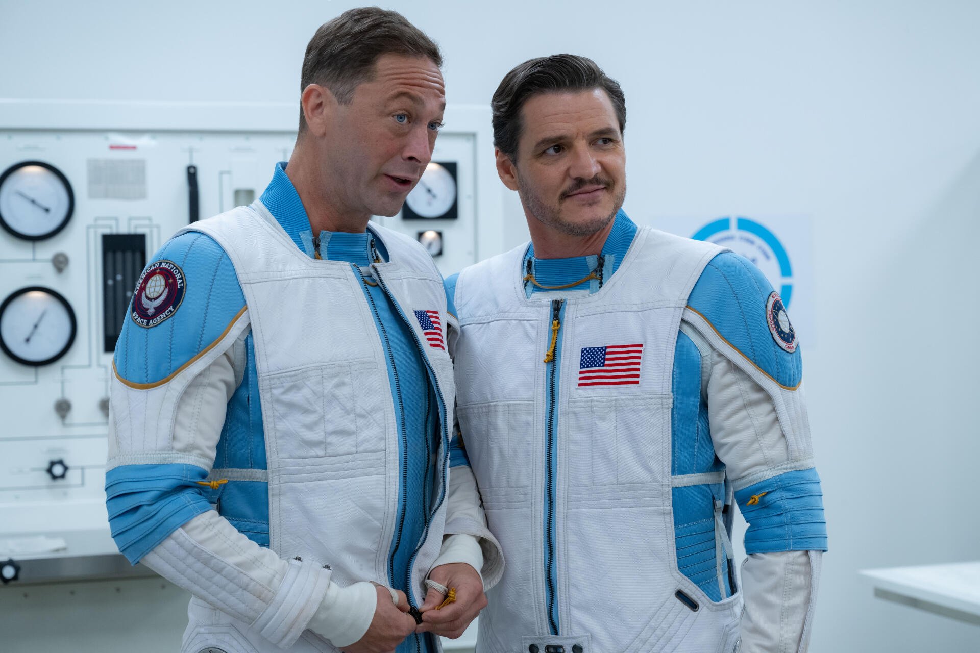 Pedro Pascal and co-star in a scene from the 2025 Fantastic Four movie, featured in an 8K Ultra HD PC desktop wallpaper.