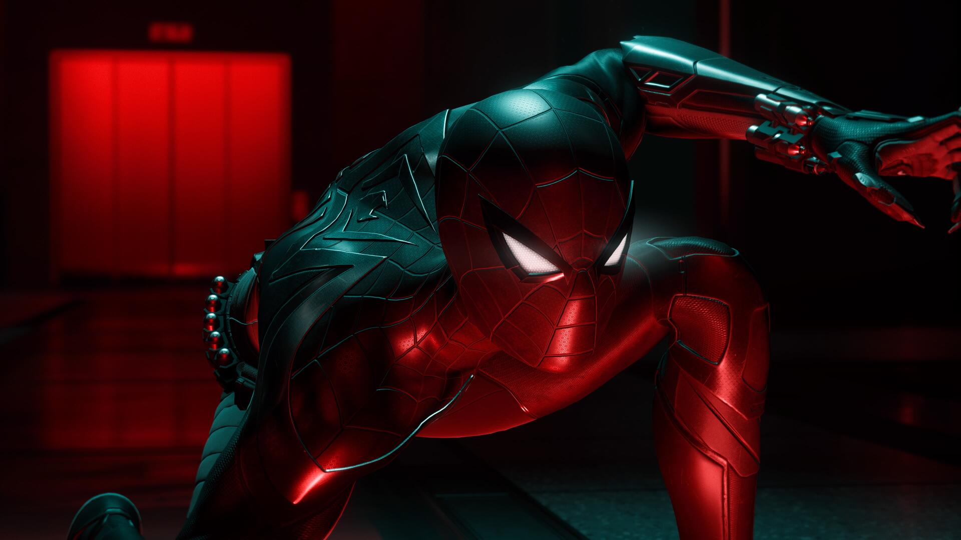 4K Ultra HD desktop wallpaper featuring Marvel's Spider-Man: Miles Morales in a dynamic pose with dramatic red and blue lighting.