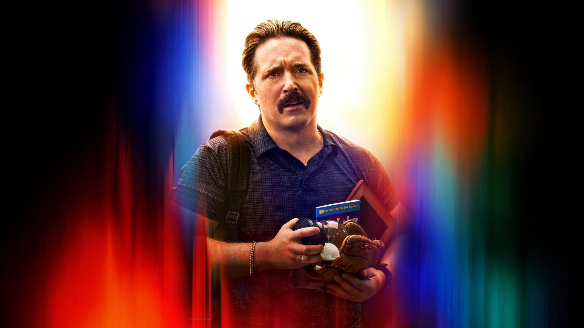 Man with a mustache holding toys and a book, backpack on, framed by vivid vertical light streaks — Superman (2025) 5K Ultra HD desktop wallpaper