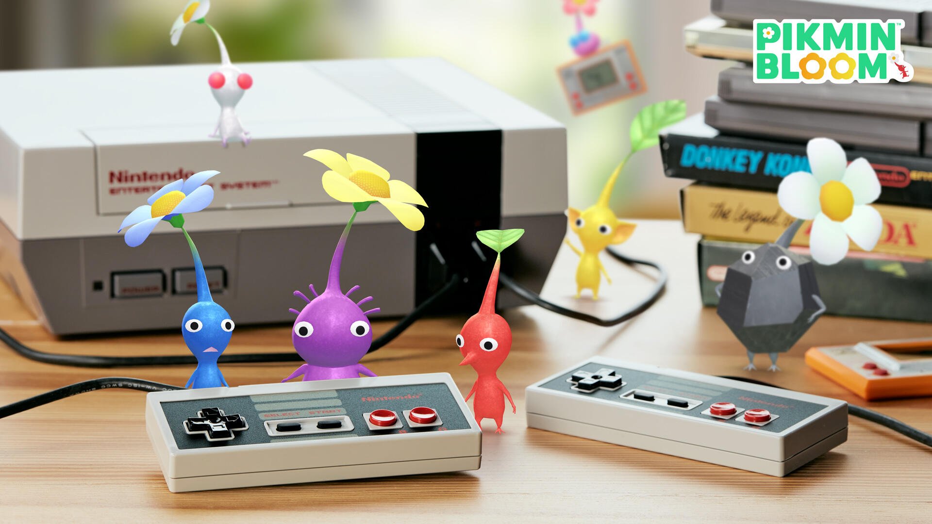 HD PC desktop wallpaper featuring colorful Pikmin characters with flowers, set around classic Nintendo controllers and retro gaming boxes.