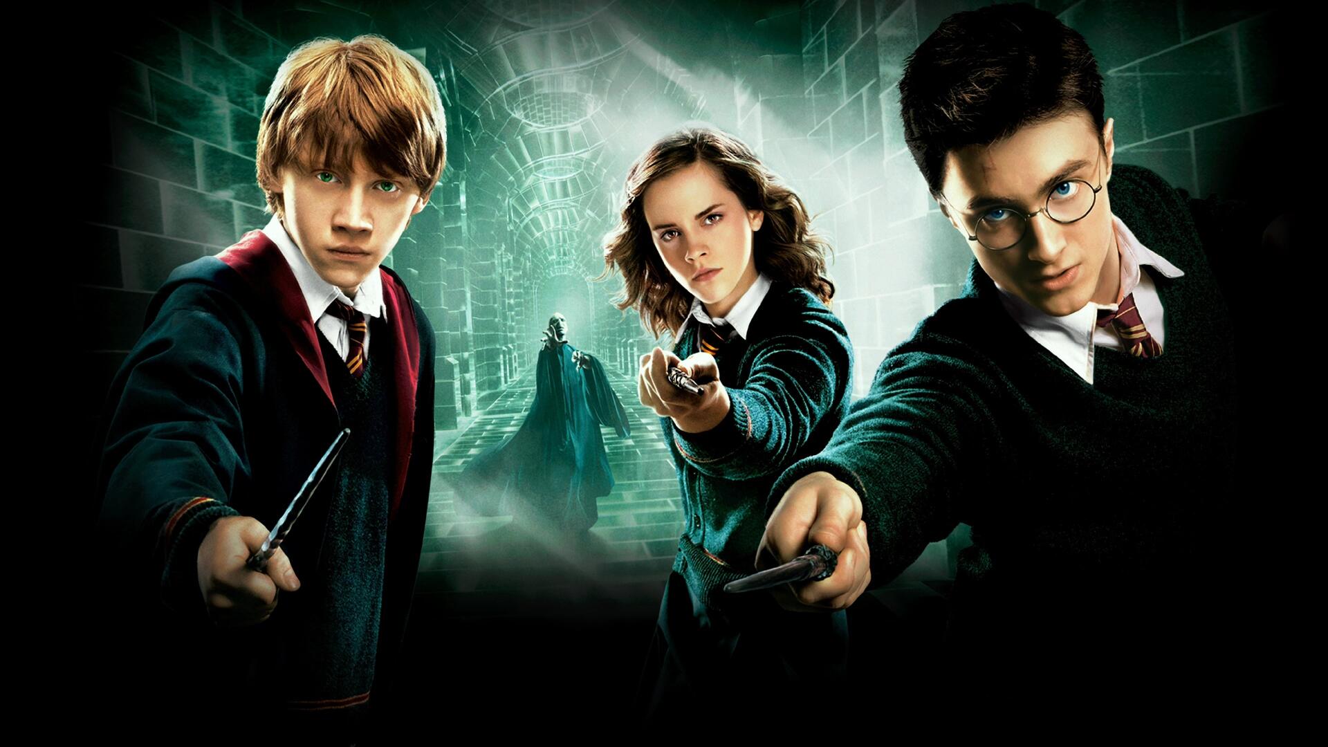 4K Ultra HD PC desktop wallpaper: Harry Potter and the Order of the Phoenix — Harry, Hermione and Ron in a green-lit corridor, wands extended as magic swirls around them.