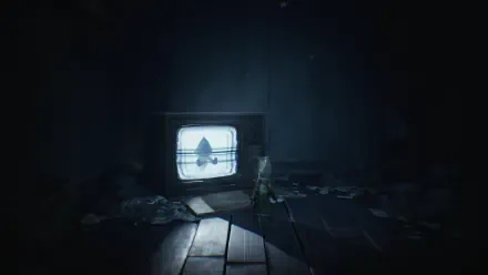 A dark, atmospheric HD wallpaper from Little Nightmares features Six standing in a dim room, with an old television casting eerie light amidst scattered debris.