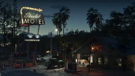HD PC desktop wallpaper from the video game Grand Theft Auto VI, featuring a nighttime scene of the Starlet Motel illuminated by neon signs and surrounded by palm trees.