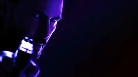 Close-up of Keanu Reeves as John Wick in a dark, moody 4K Ultra HD movie wallpaper for PC desktop background.