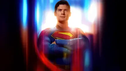 Superman (2025) stands confidently with crossed arms in a vibrant 4K Ultra HD PC desktop wallpaper and background featuring glowing light effects.