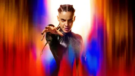 5K Ultra HD PC desktop wallpaper: a fierce, futuristic Superman (2025) reaching forward amid vivid red, blue and gold light streaks.