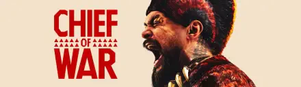 HD PC desktop wallpaper featuring a fierce close-up of the roaring warrior from the TV show Chief of War, highlighting tribal details and bold red text.