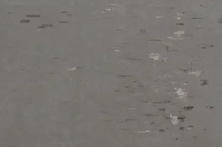 Grey abstract glitch texture with scattered pixel streaks and subtle noise — 4K Ultra HD PC desktop wallpaper and background.