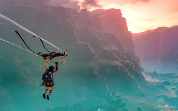 Link hangs from a paraglider over misty canyons at sunset — The Legend of Zelda: Tears of the Kingdom HD PC desktop wallpaper and background.