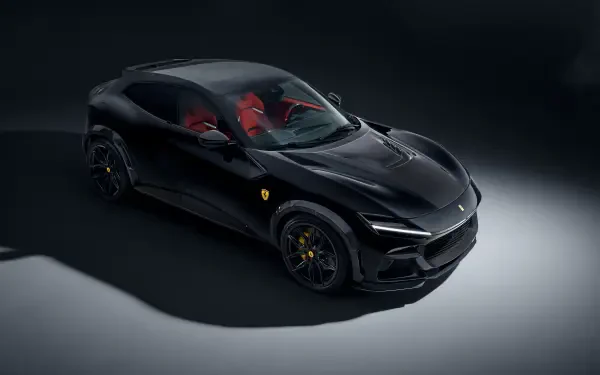 A sleek black Ferrari Purosangue, showcasing its elegant design and striking red interior, captured in stunning 4K Ultra HD. A captivating desktop wallpaper for car enthusiasts.