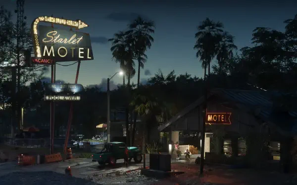 HD PC desktop wallpaper from the video game Grand Theft Auto VI, featuring a nighttime scene of the Starlet Motel illuminated by neon signs and surrounded by palm trees.