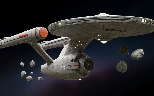 4K Ultra HD PC desktop wallpaper featuring the Star Trek Enterprise navigating through an asteroid field in deep space.