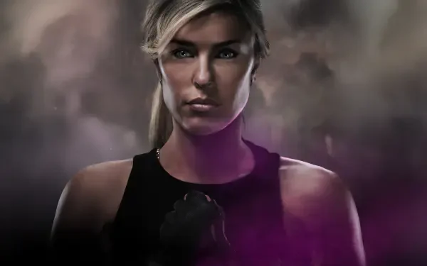 A striking 4K Ultra HD PC desktop wallpaper featuring a fierce female warrior from Mortal Kombat 2 (2025) against a smoky, dark background.