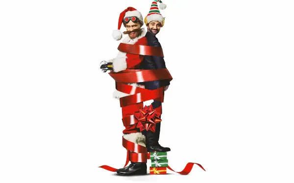 Two men in festive hats wrapped together with red ribbon and bows, standing on a present, styled as an 8K Ultra HD PC desktop wallpaper with a Sonic the Hedgehog 3 theme.