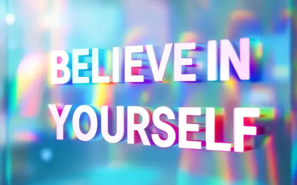 4K Ultra HD PC desktop wallpaper with the motivational quote BELIEVE IN YOURSELF in bold white letters over a vibrant pastel bokeh and subtle glitch-style background.