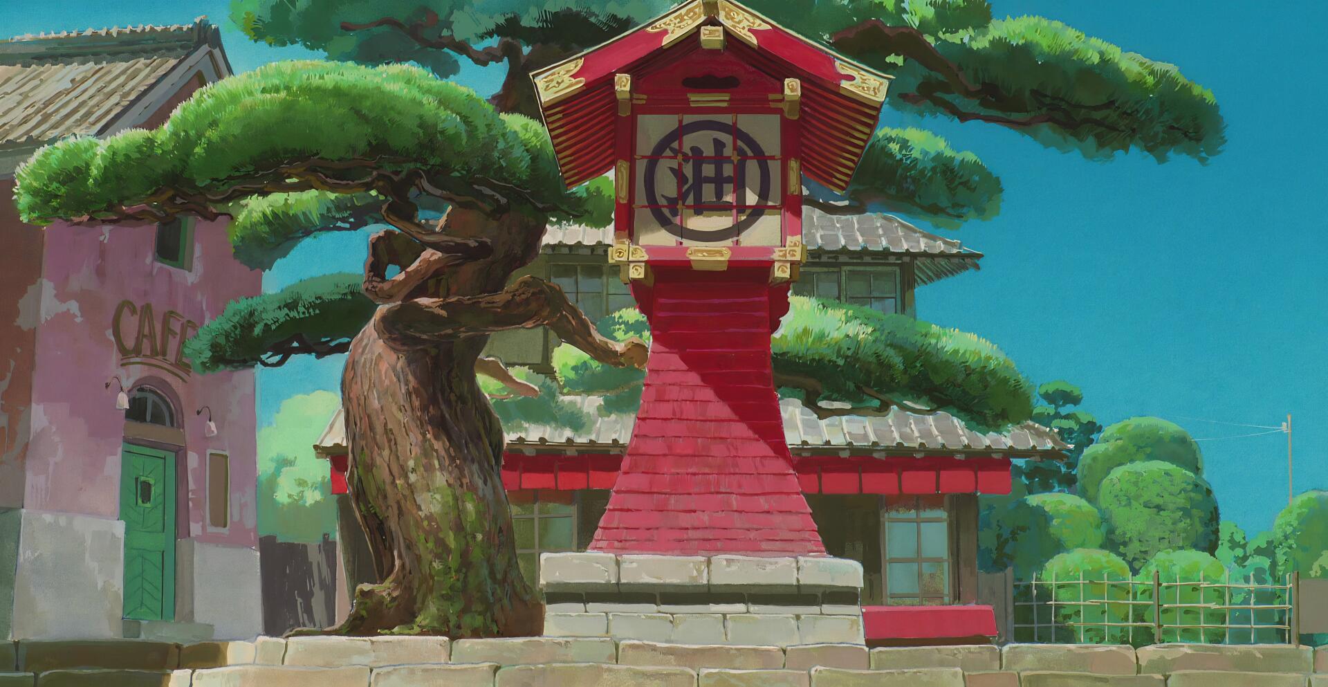 Studio Ghibli Spirited Away anime 4K Ultra HD desktop wallpaper showing a red altar shrine beside a gnarled tree, tiled roofs and lush greenery under a clear turquoise sky.