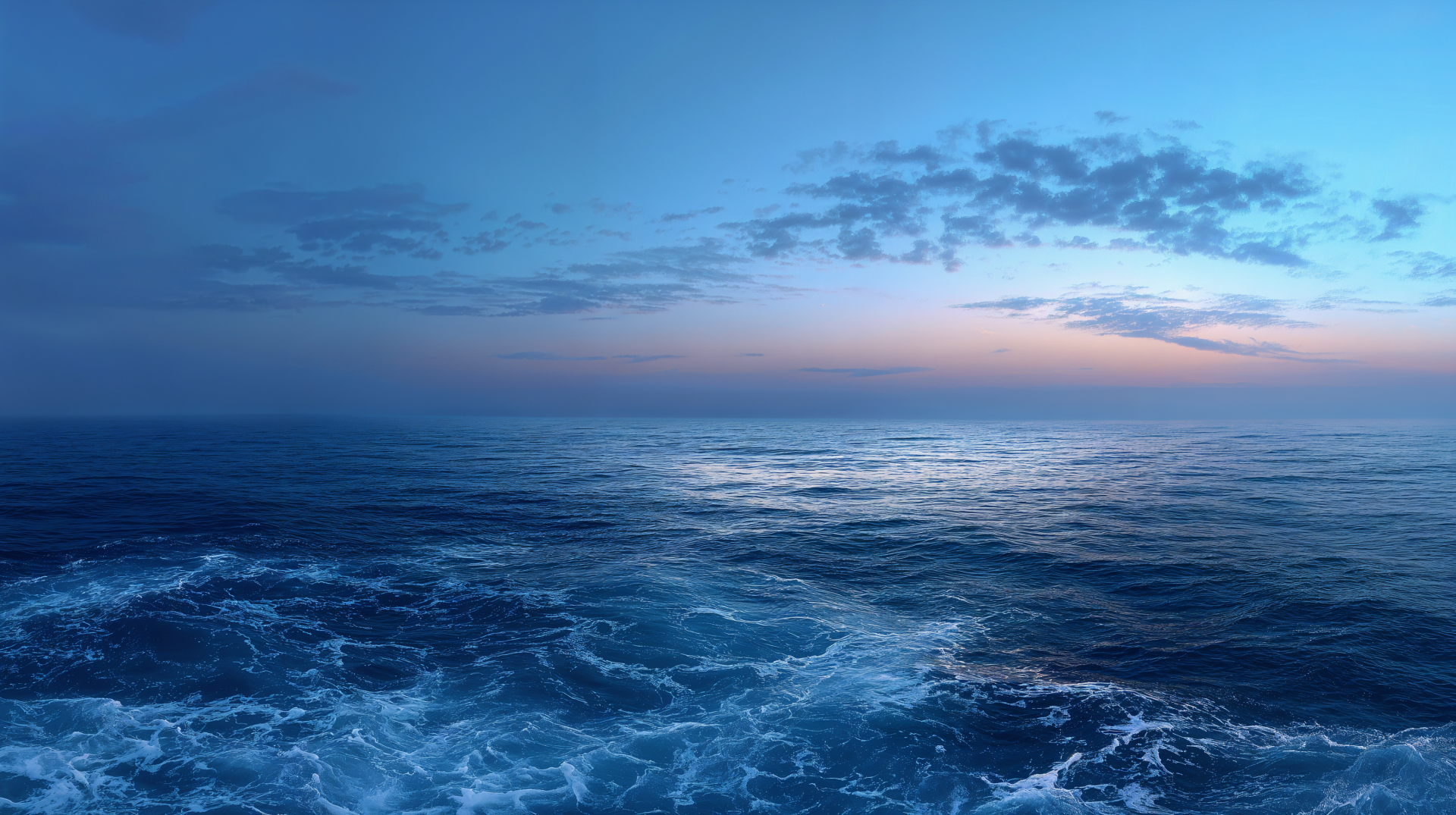 Nature ocean horizon 4K Ultra HD PC desktop wallpaper: tranquil dawn over a vast blue sea, gentle waves and scattered clouds on the glowing horizon.