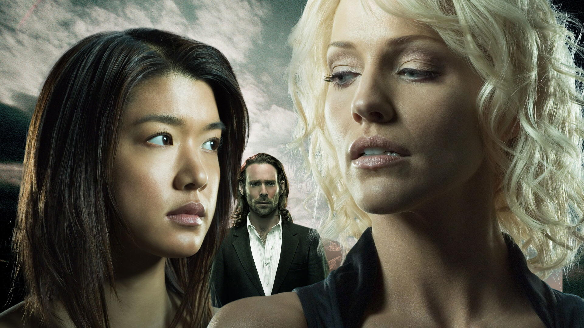 Hawaii Five-0 4K Ultra HD PC desktop wallpaper: two women in the foreground and a man behind, faces serious against a dramatic cloudy sky.