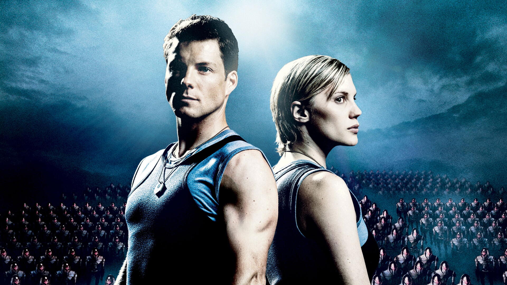 Battlestar Galactica (2003) 2K Quad HD PC wallpaper: two uniformed officers stand back-to-back with a massed crew and fleet behind them beneath a dramatic, stormy sky.